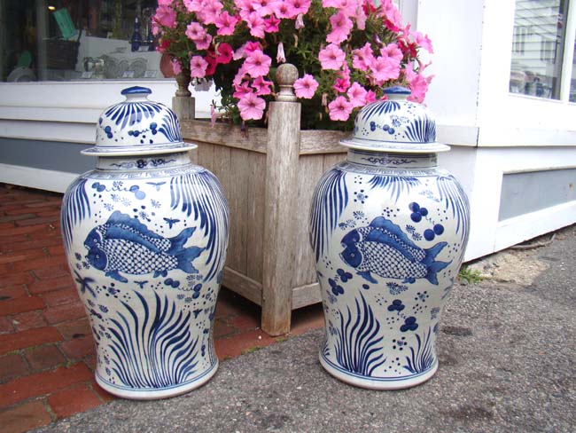 An attractive and large pair of Chinese Temple jars with fish motif.